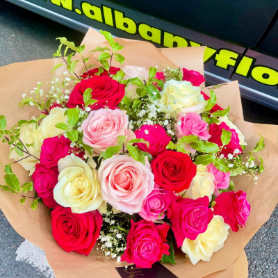 Ruby Romance - A luxurious bouquet bursting with red, cerise and blush roses finished with delicate gypsophila and fresh greenery, expertly arranged by Albany Florists. Bold, romantic and designed to impress.
