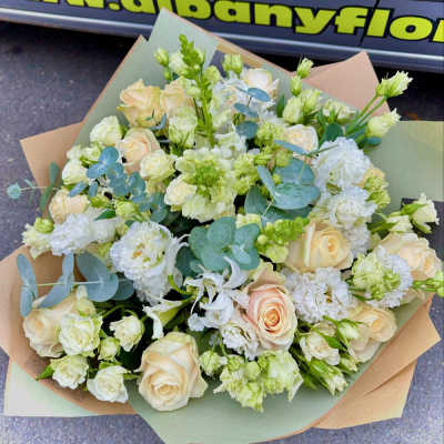 Ivory Whisper - A timeless collection of ivory roses, lisianthus and eucalyptus in soft neutral tones, carefully handcrafted by Albany Florists. Elegant, graceful and suitable for every occasion.