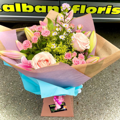 Sweet Lily Blush - Pretty pink lilies, roses and spray roses create a bouquet handcrafted by Albany Florists that feels soft, elegant and full of romance.