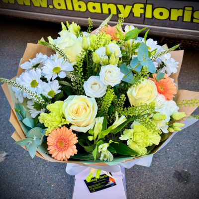 Spring Meadow - A fresh seasonal mix of cream roses, daisies and peach-toned blooms designed by Albany Florists with a cheerful countryside feel. Bright, uplifting and full of charm.